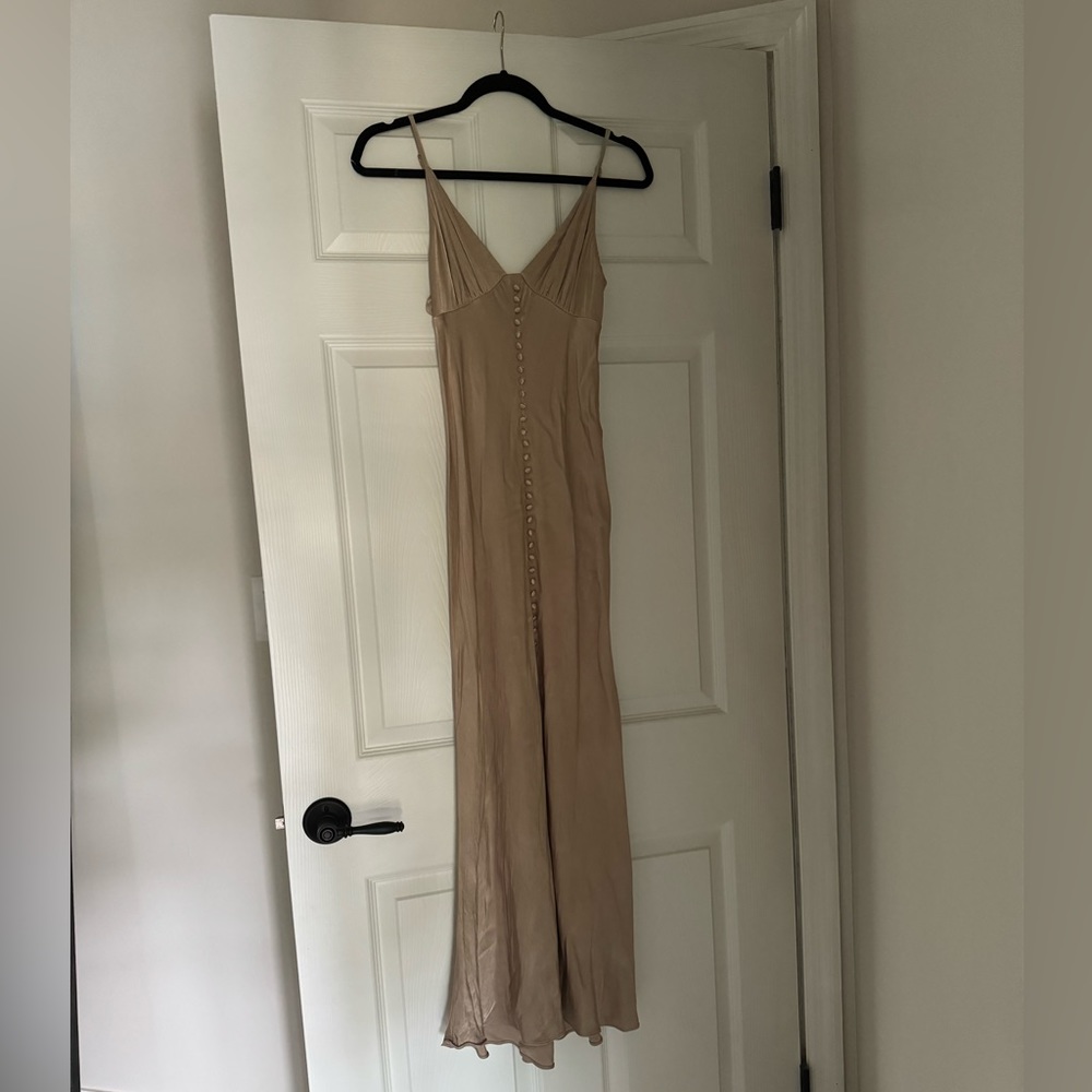 This beautiful bridesmaid dress in a size 8 by Shona Joy